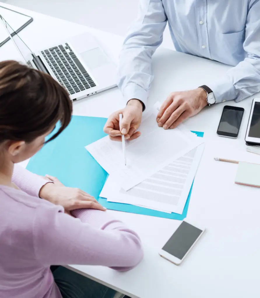 Advisor Meeting with a customer in his office he is